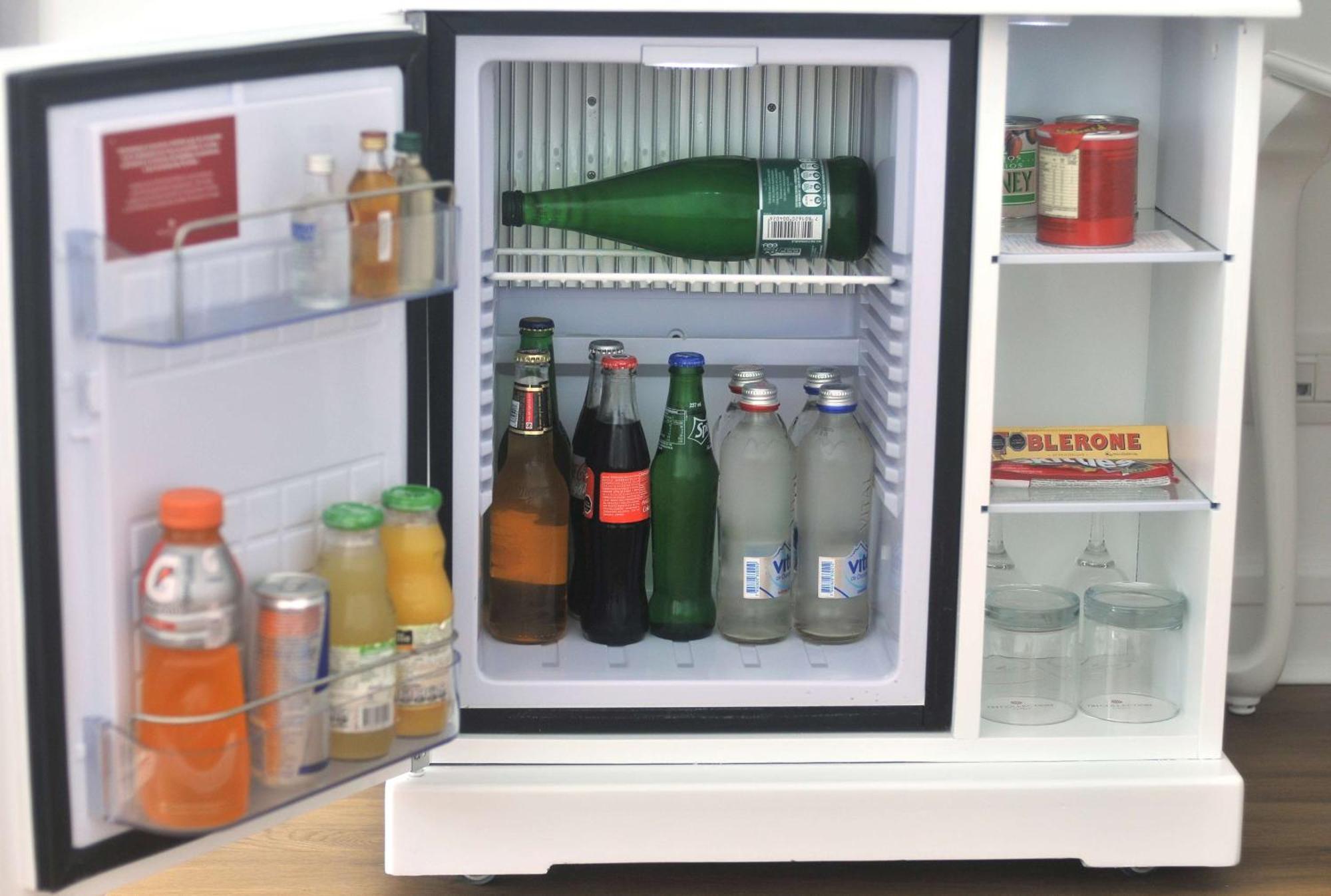 Nh Collection Plaza Santiago Exterior foto A mini-bar